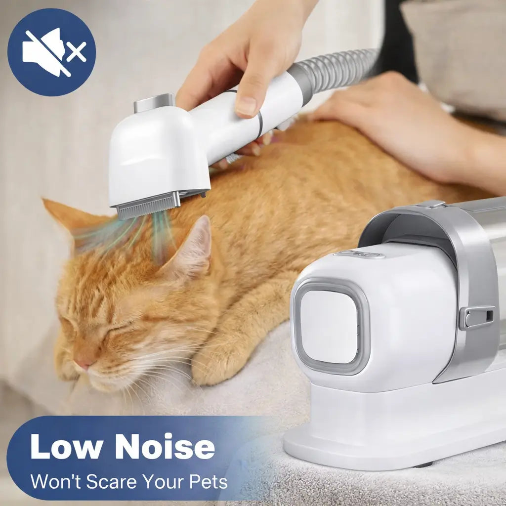 Person grooming an orange cat with a pet grooming device emphasizing low noise and pet safety