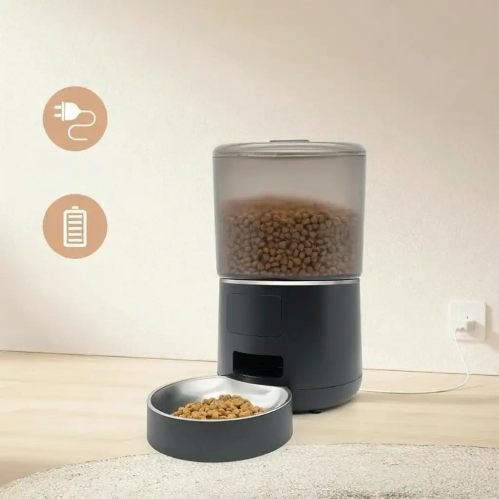 Pet food dispenser with a bowl of kibble on a light wooden floor with symbols of electric plug and battery