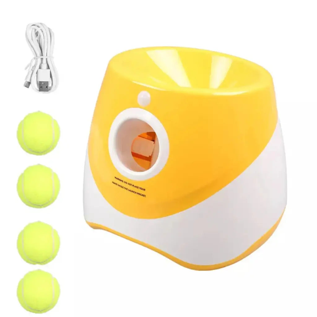Yellow and white pet ball launcher with tennis balls on a white background